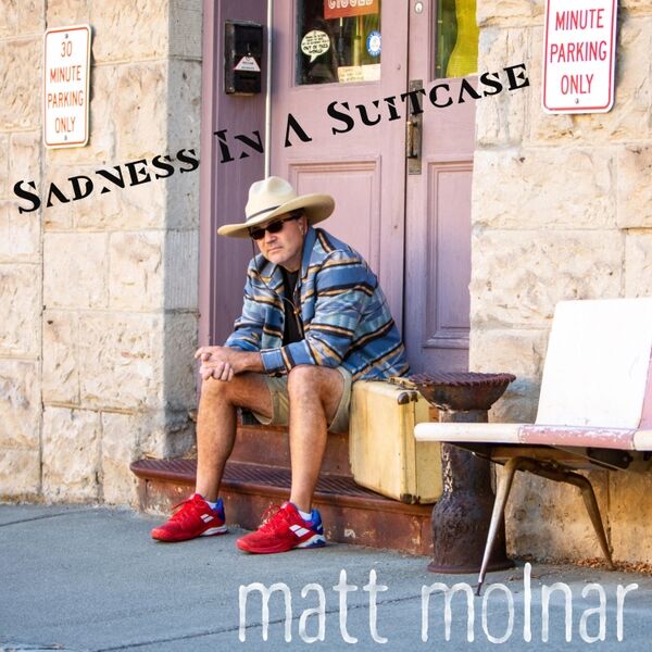 Cover art for Sadness in a Suitcase